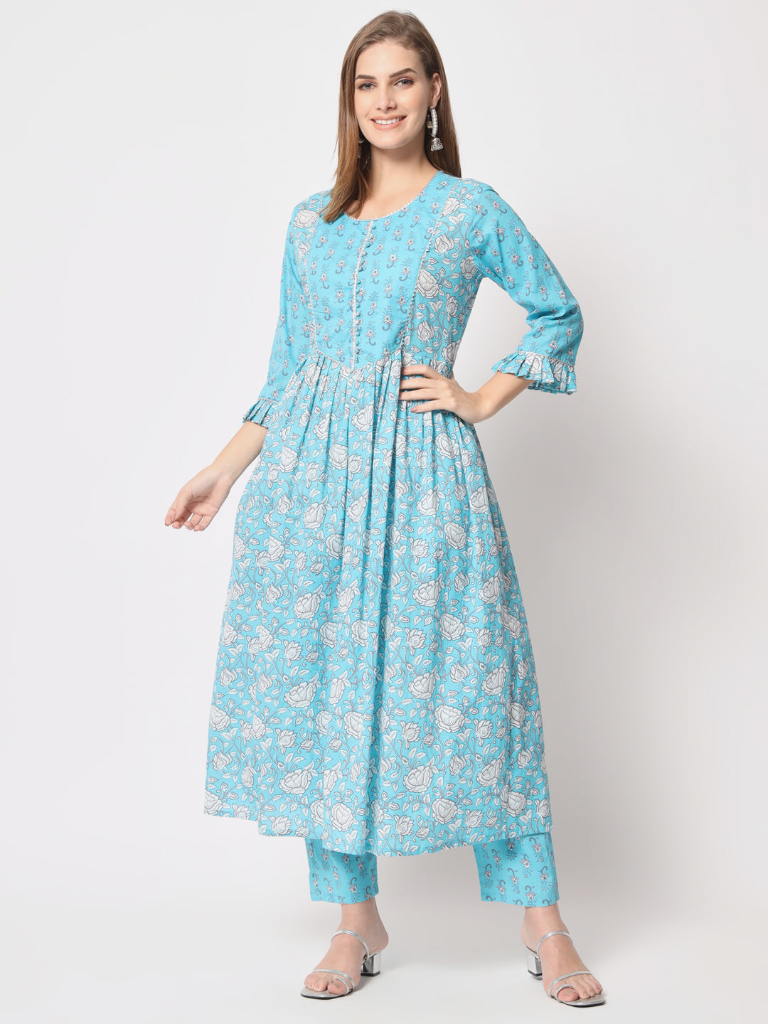 Turquoise printed pure cotton kurta set.
