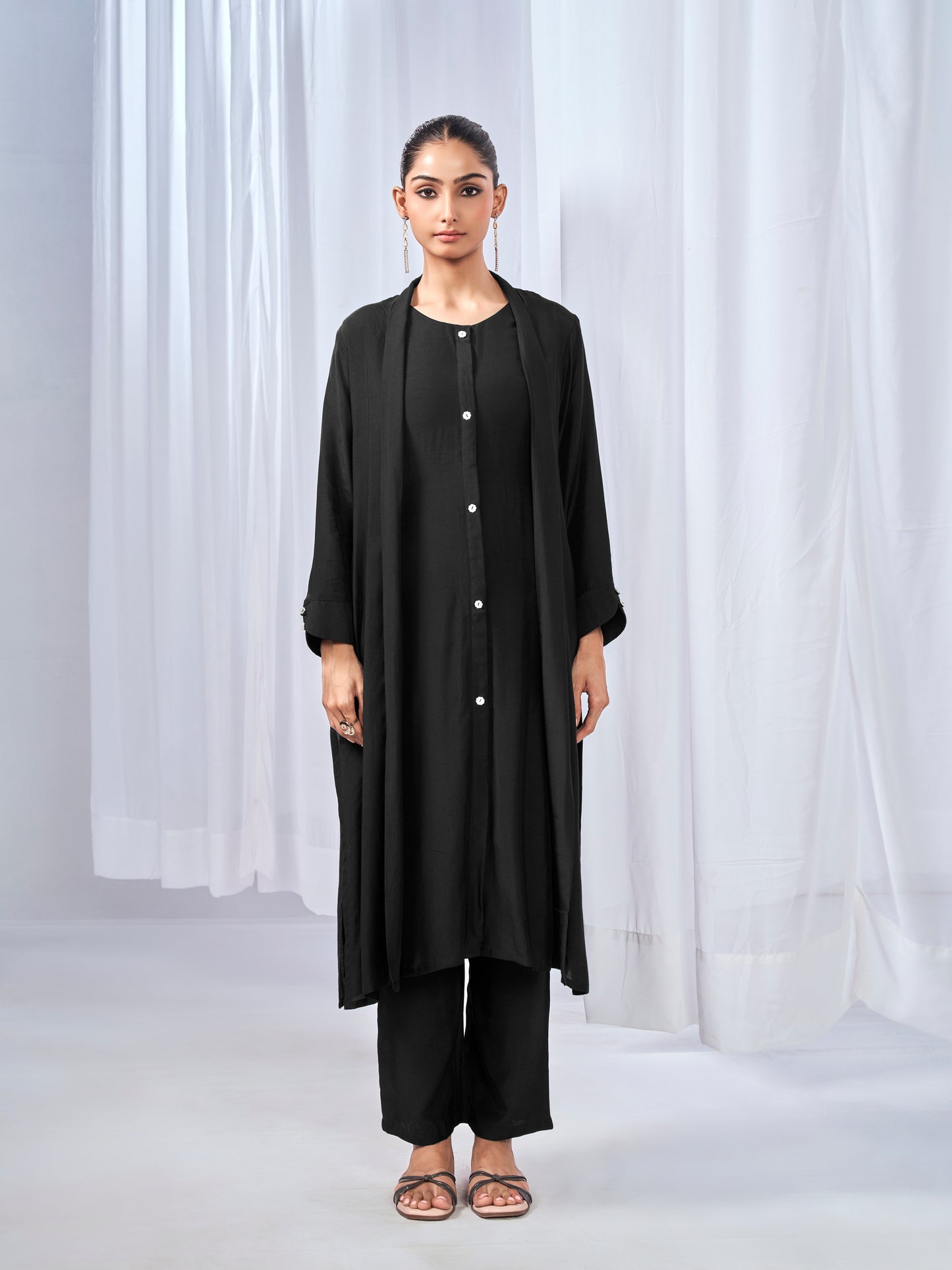 Black three-piece co-ord set with shrug