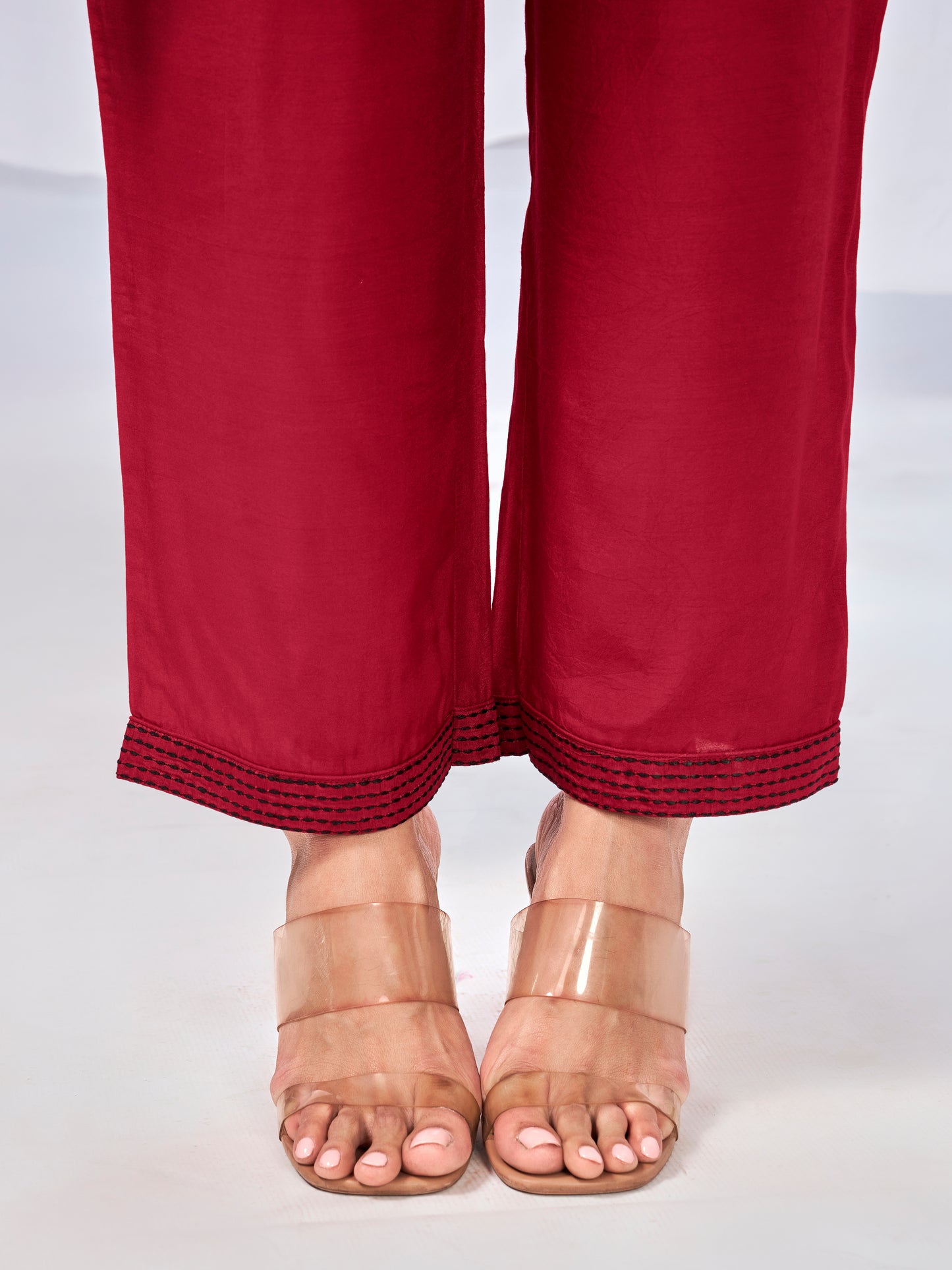 Red co-ord set with buttoned neckline