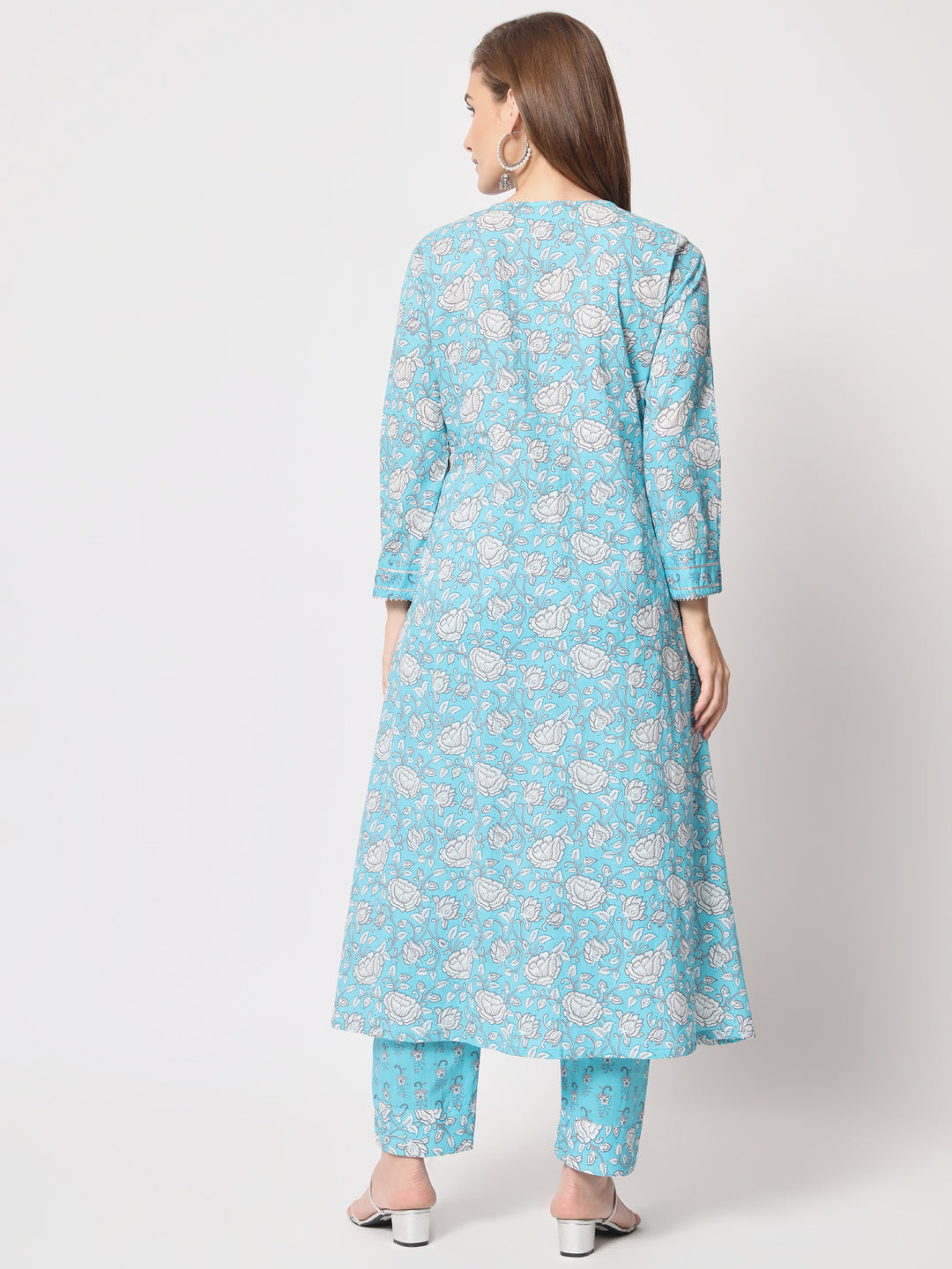 Turquoise printed pure cotton kurta set.