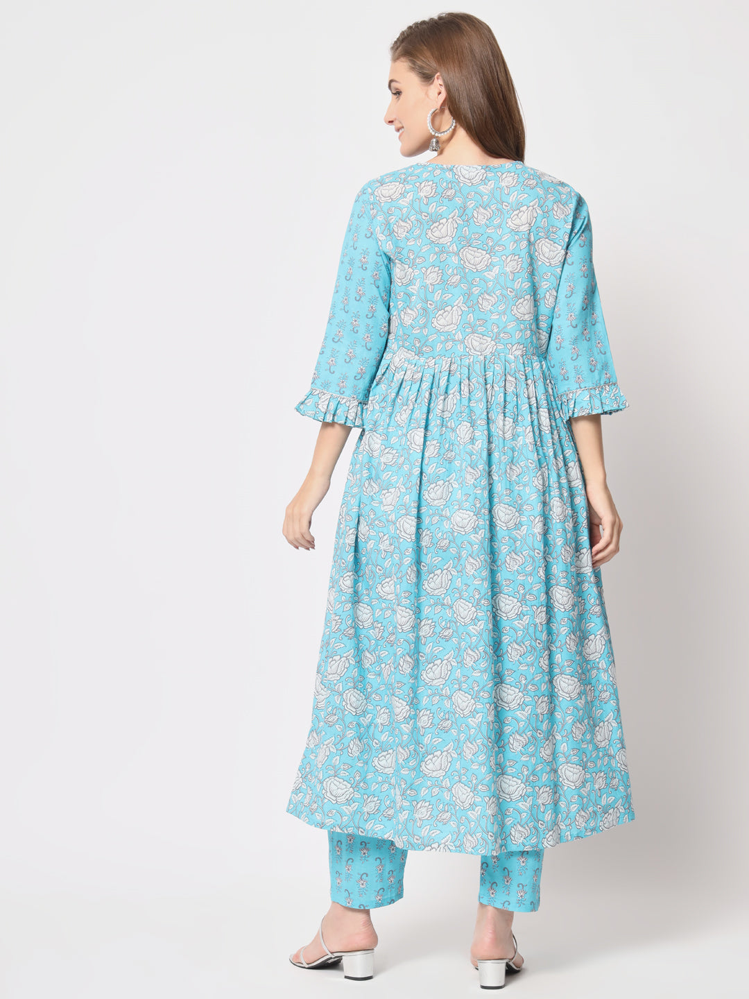 Turquoise printed pure cotton kurta set.