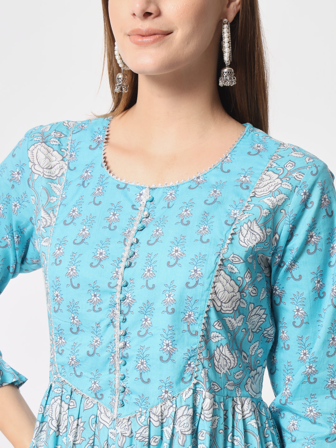 Turquoise printed pure cotton kurta set.