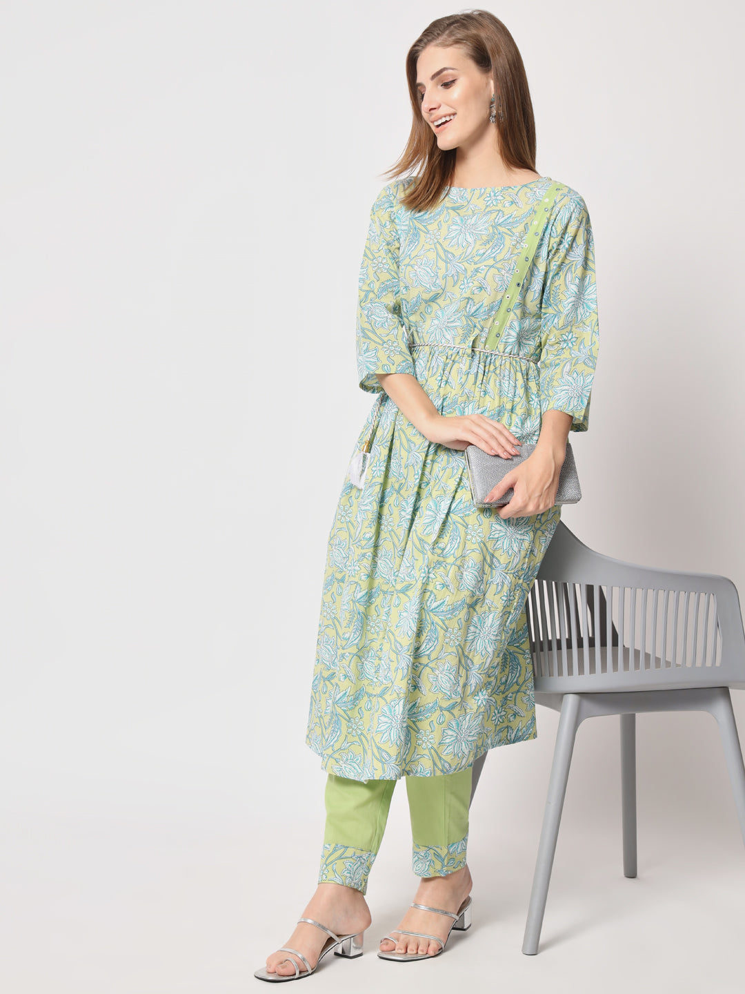 Easy, breezy and beautifully tailored- Green and blue printed kurta set with rope belt for everyday wear.