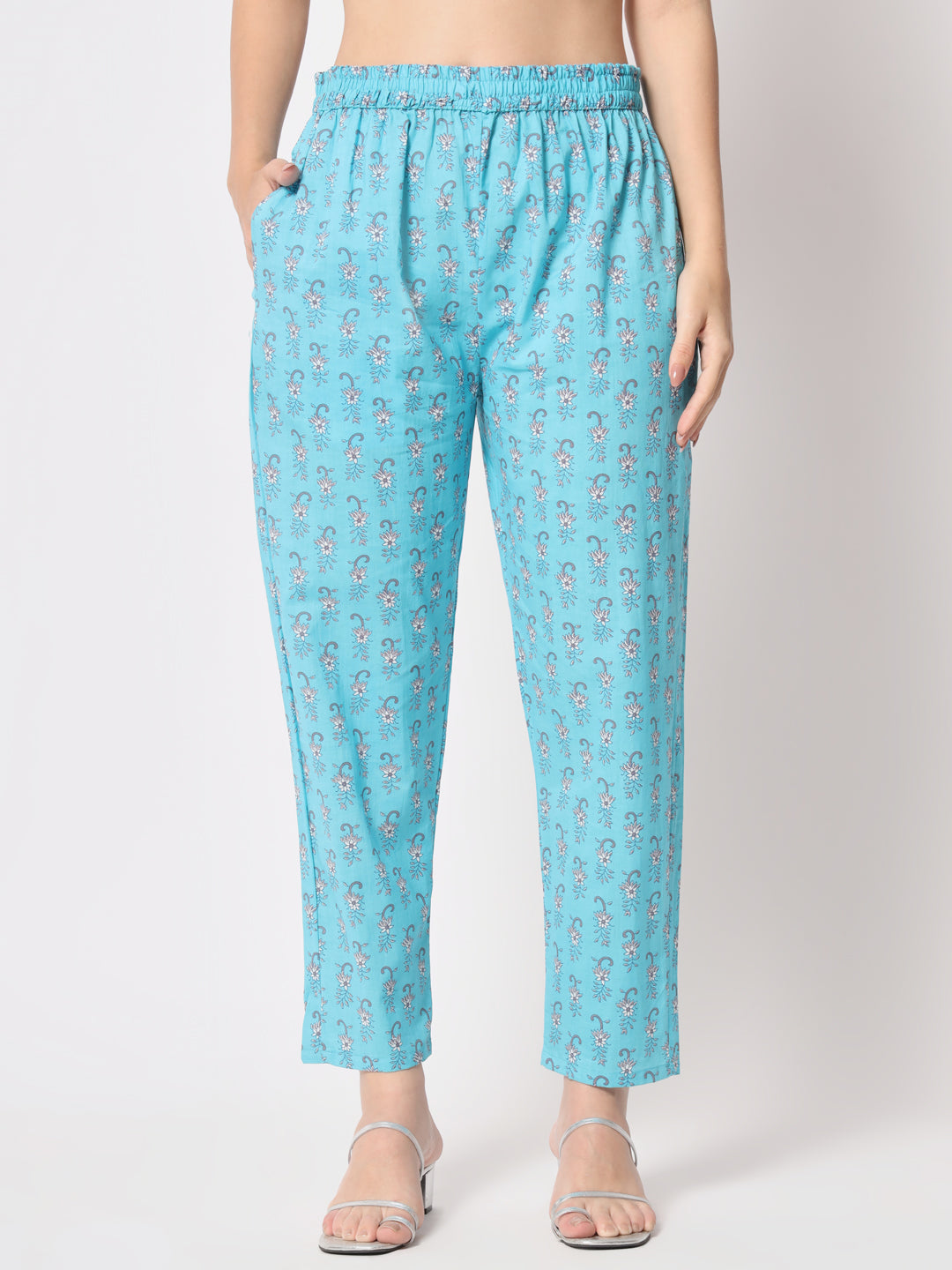 Turquoise printed pure cotton kurta set.