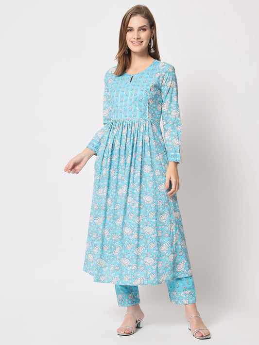 Turquoise printed pure cotton kurta set.