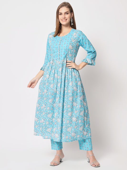 Turquoise printed pure cotton kurta set.