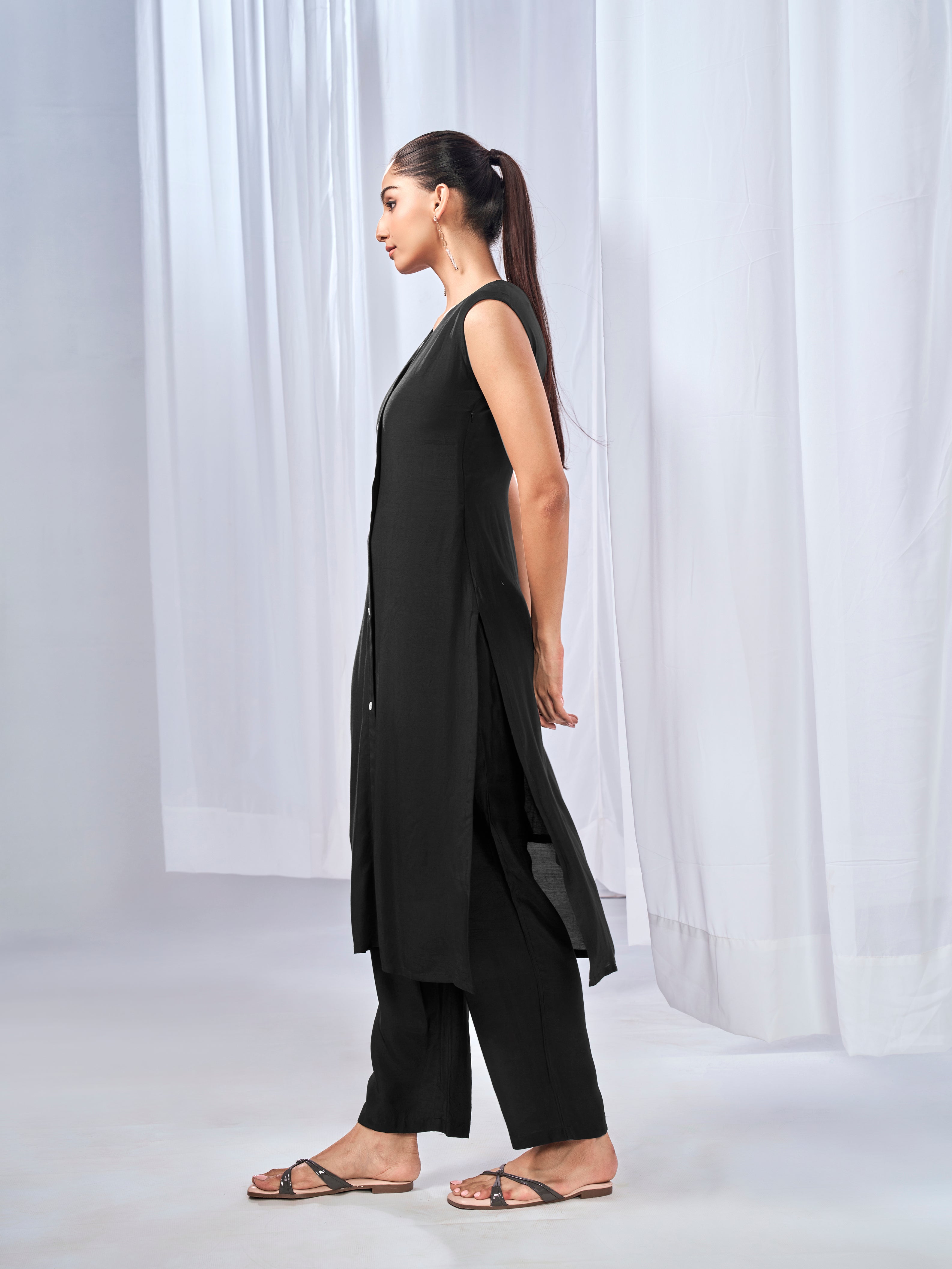 Black three-piece co-ord set with shrug