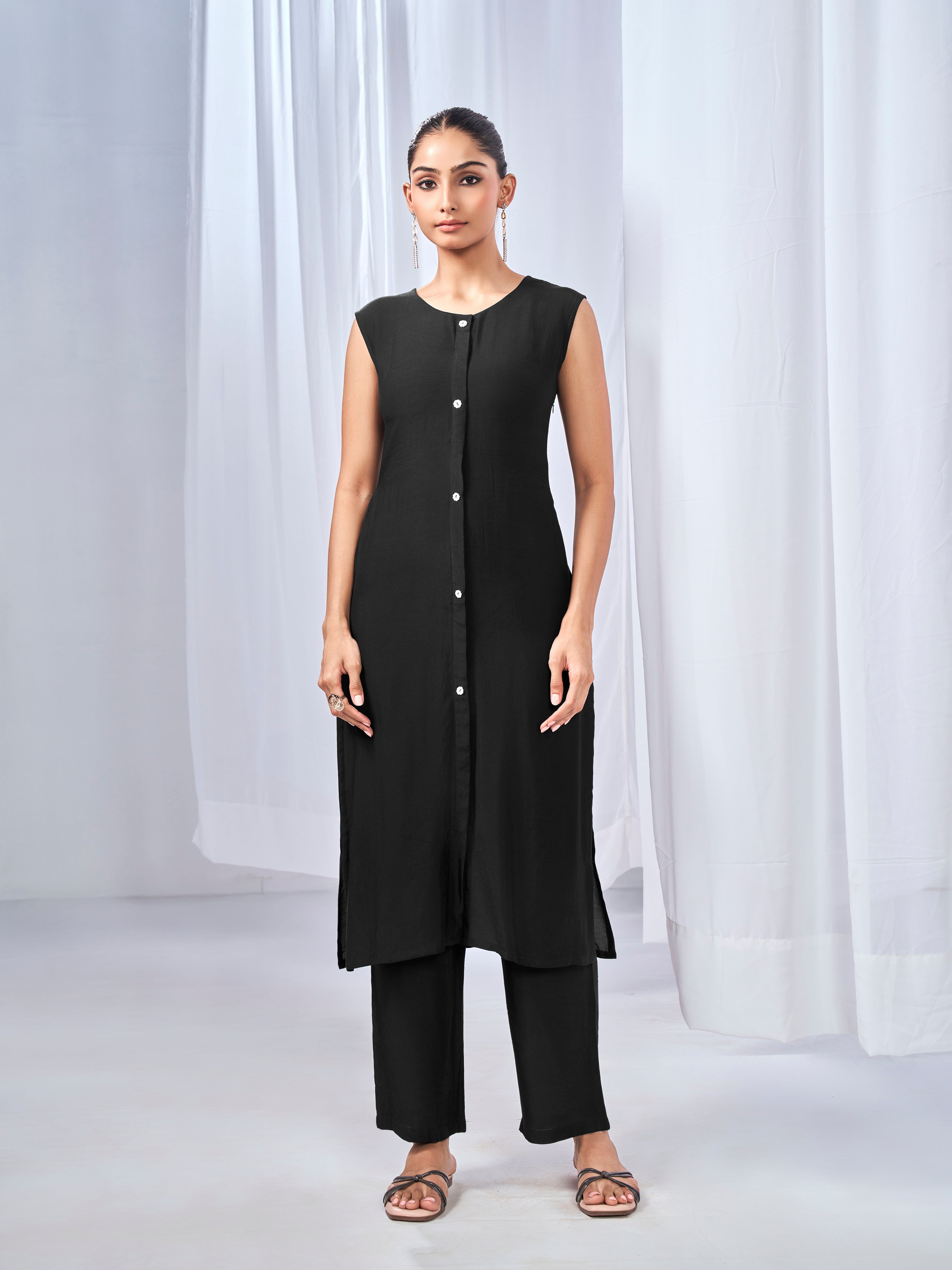 Black three-piece co-ord set with shrug