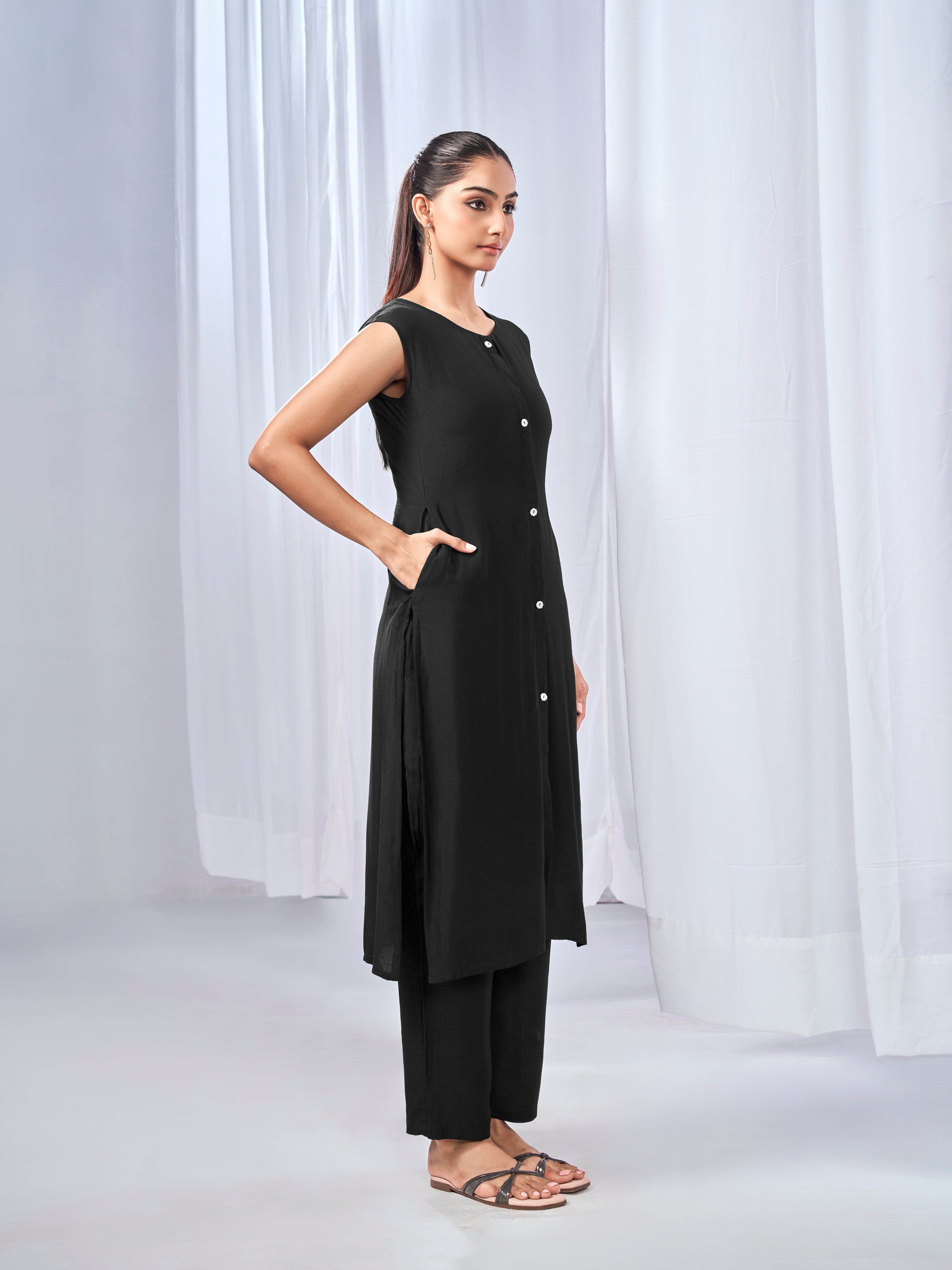 Black three-piece co-ord set with shrug