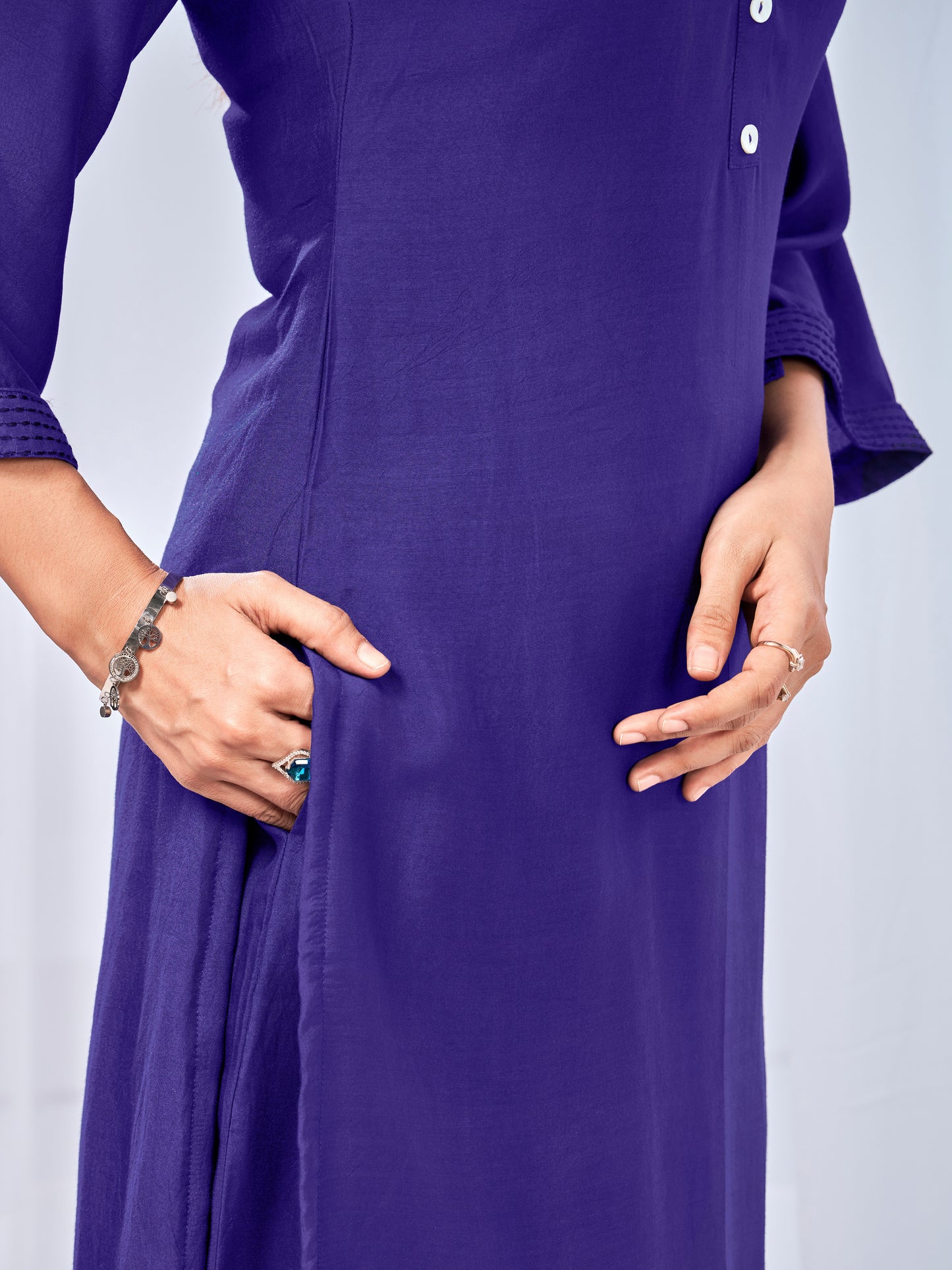 Purple co-ord set with subtle sticthing pattern