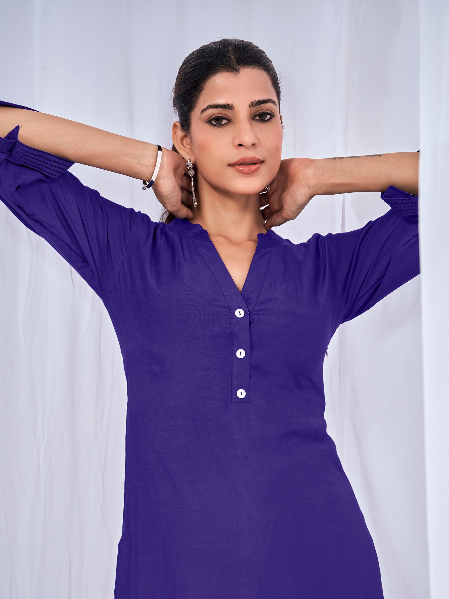 Purple co-ord set with subtle sticthing pattern