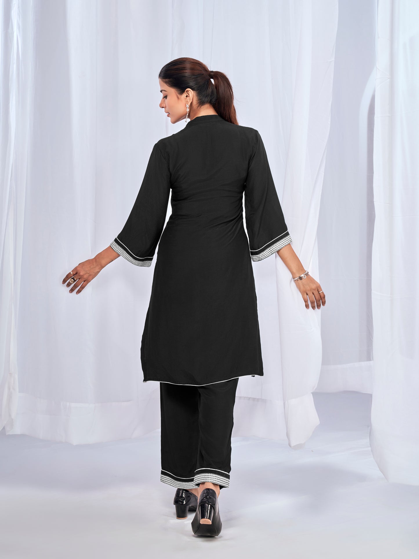 Black coord set with subtle sticthing pattern