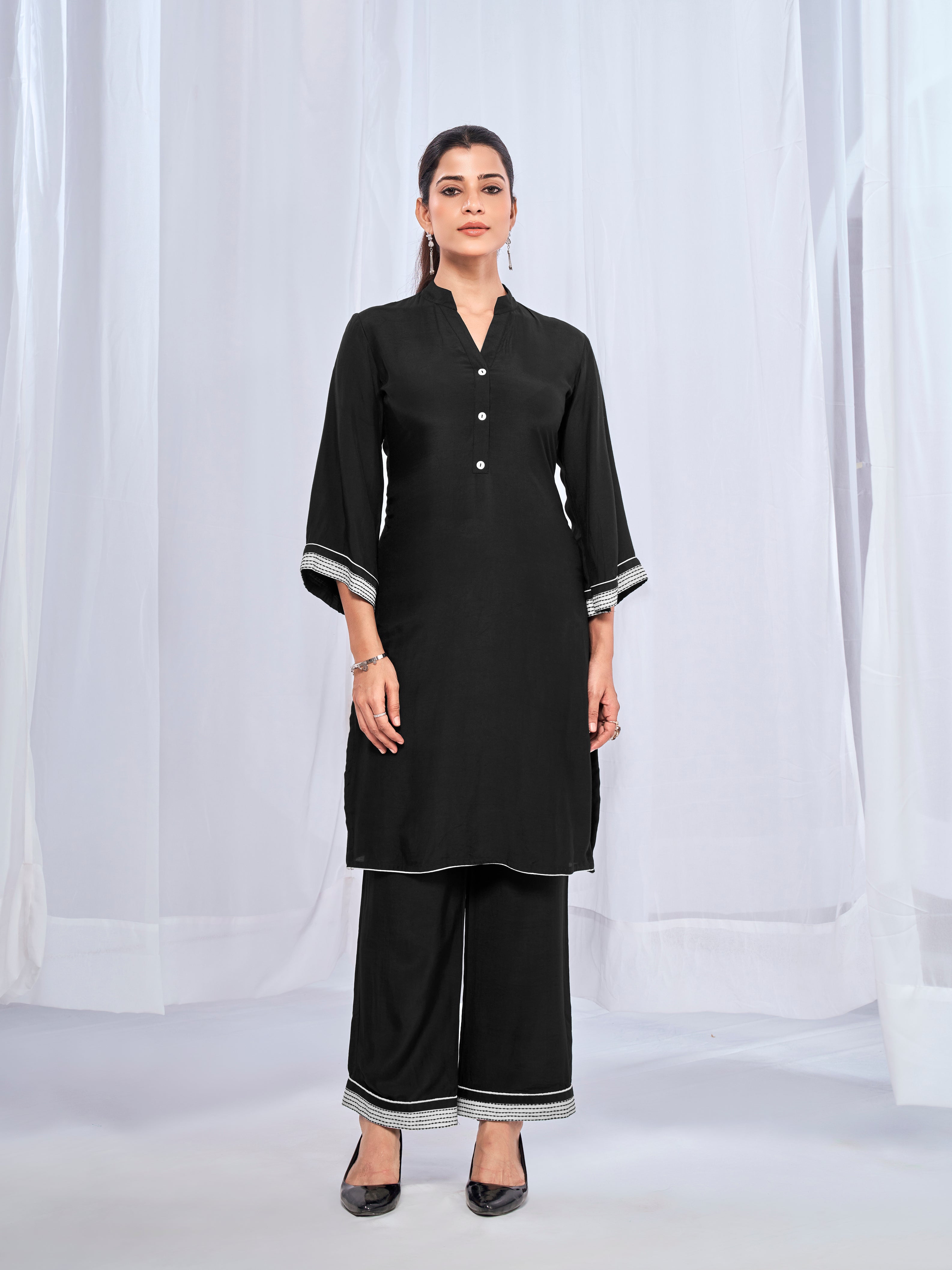 Black coord set with subtle sticthing pattern