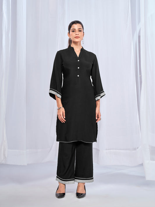 Black coord set with subtle sticthing pattern