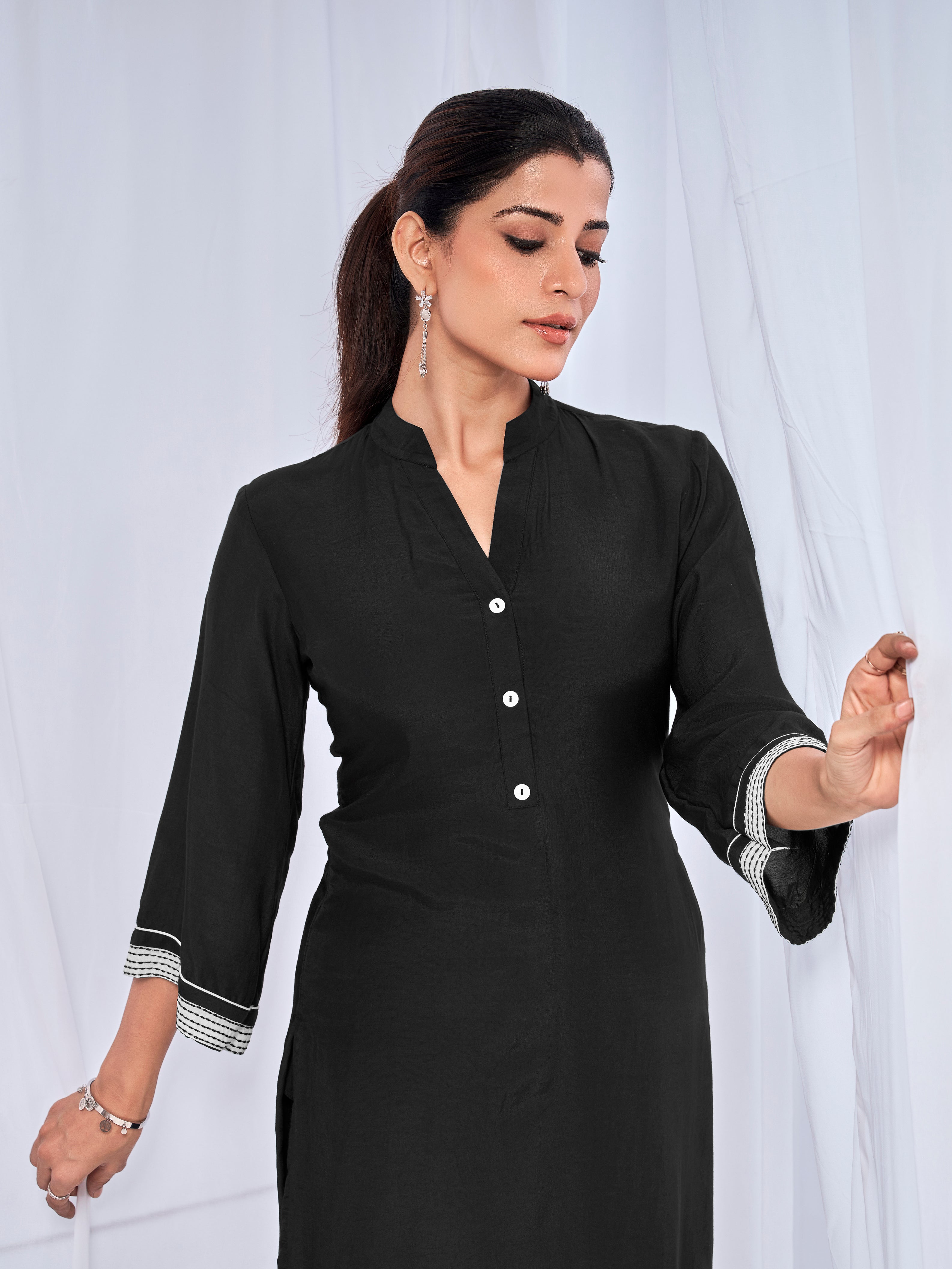 Black coord set with subtle sticthing pattern