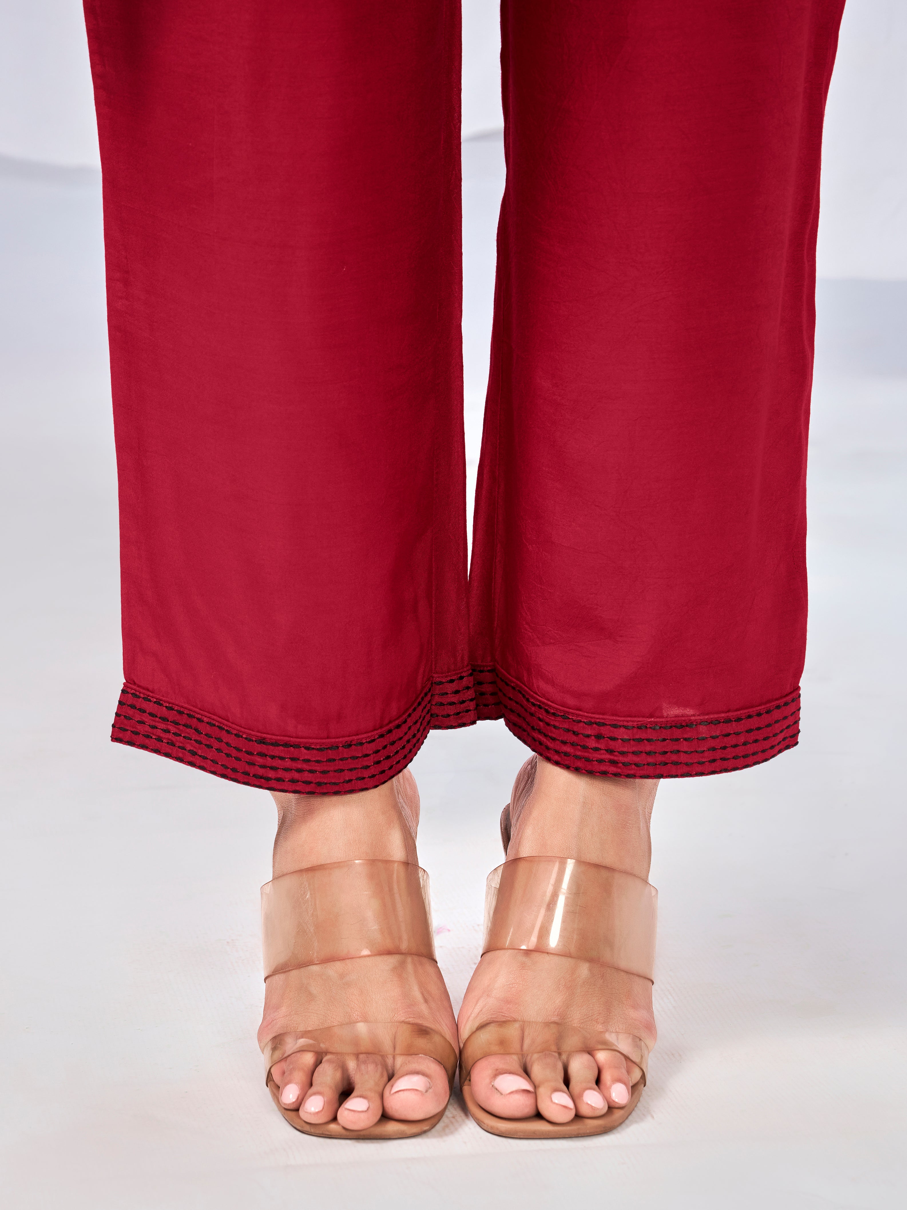 Red co-ord set with buttoned neckline