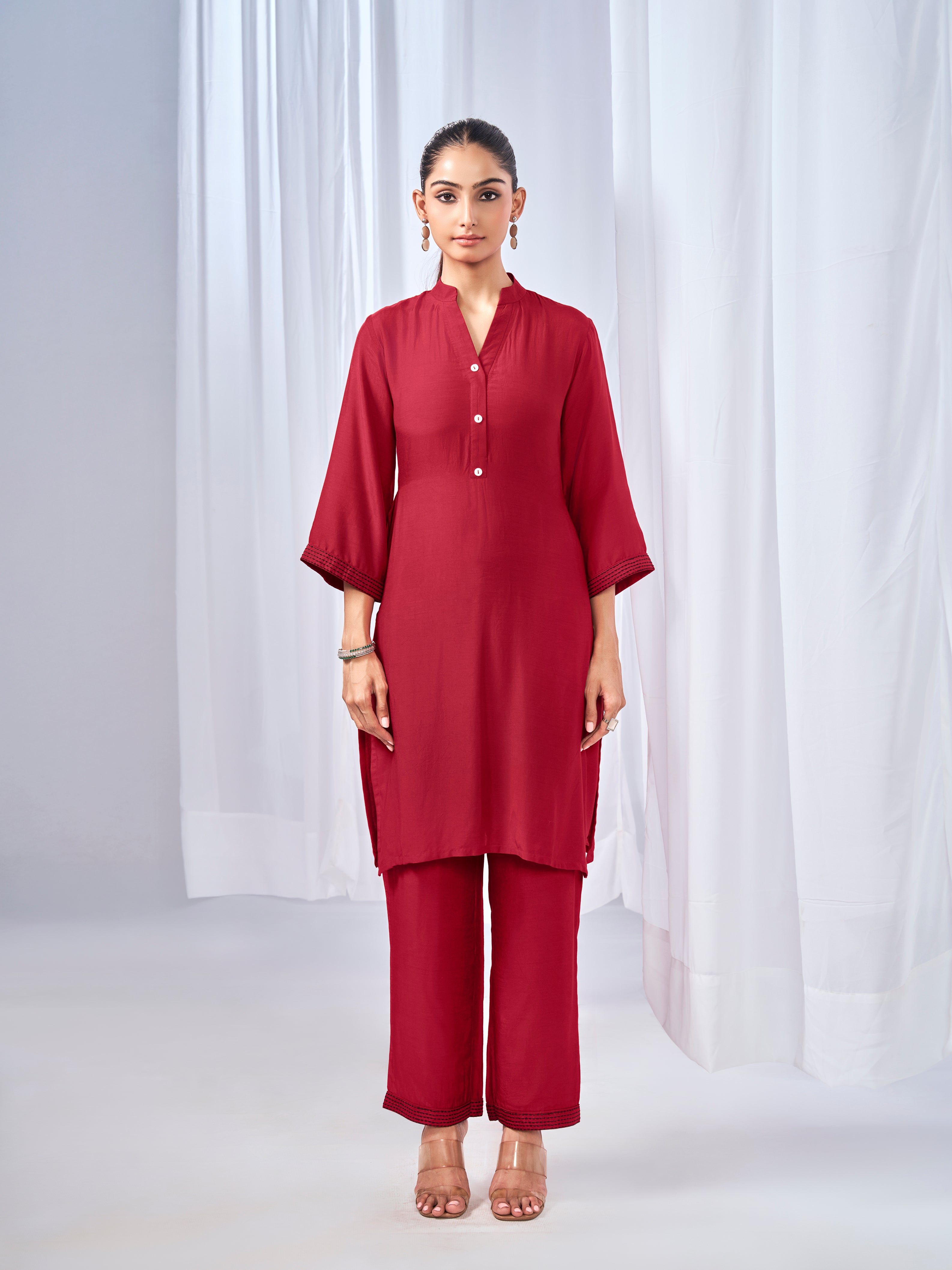 Red co-ord set with buttoned neckline