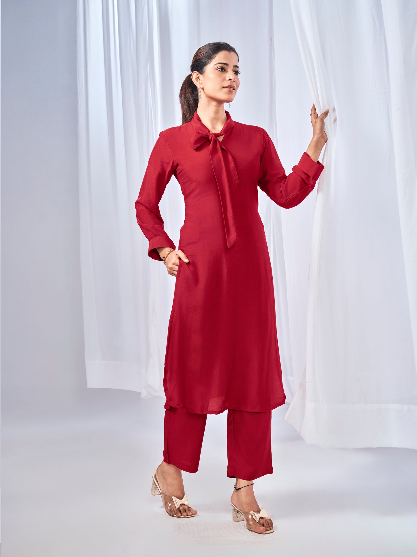 Red coord set with stylish tie-neck detail